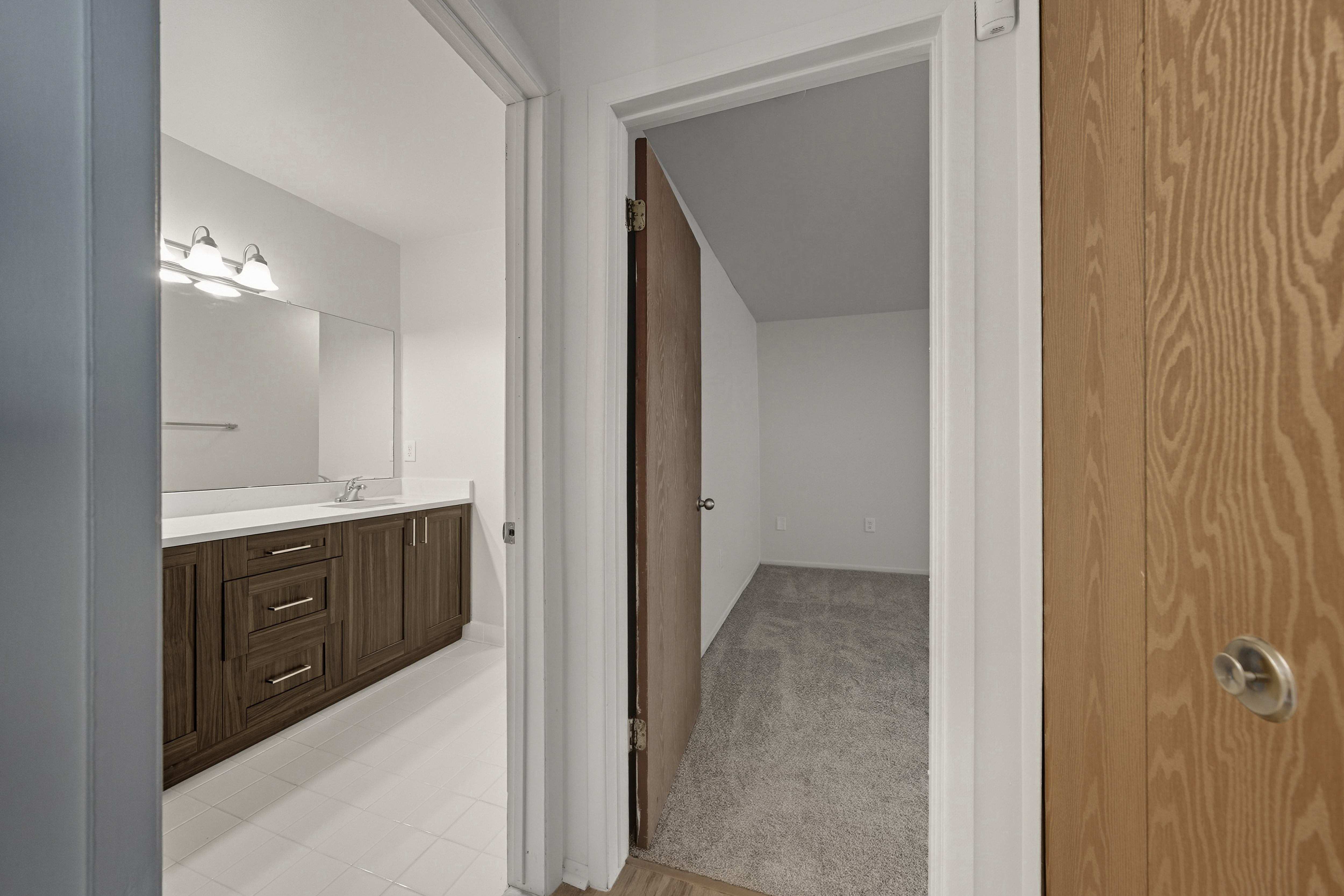 Roomy bathroom and bedroom at Franklin River Apartments in Southfield
