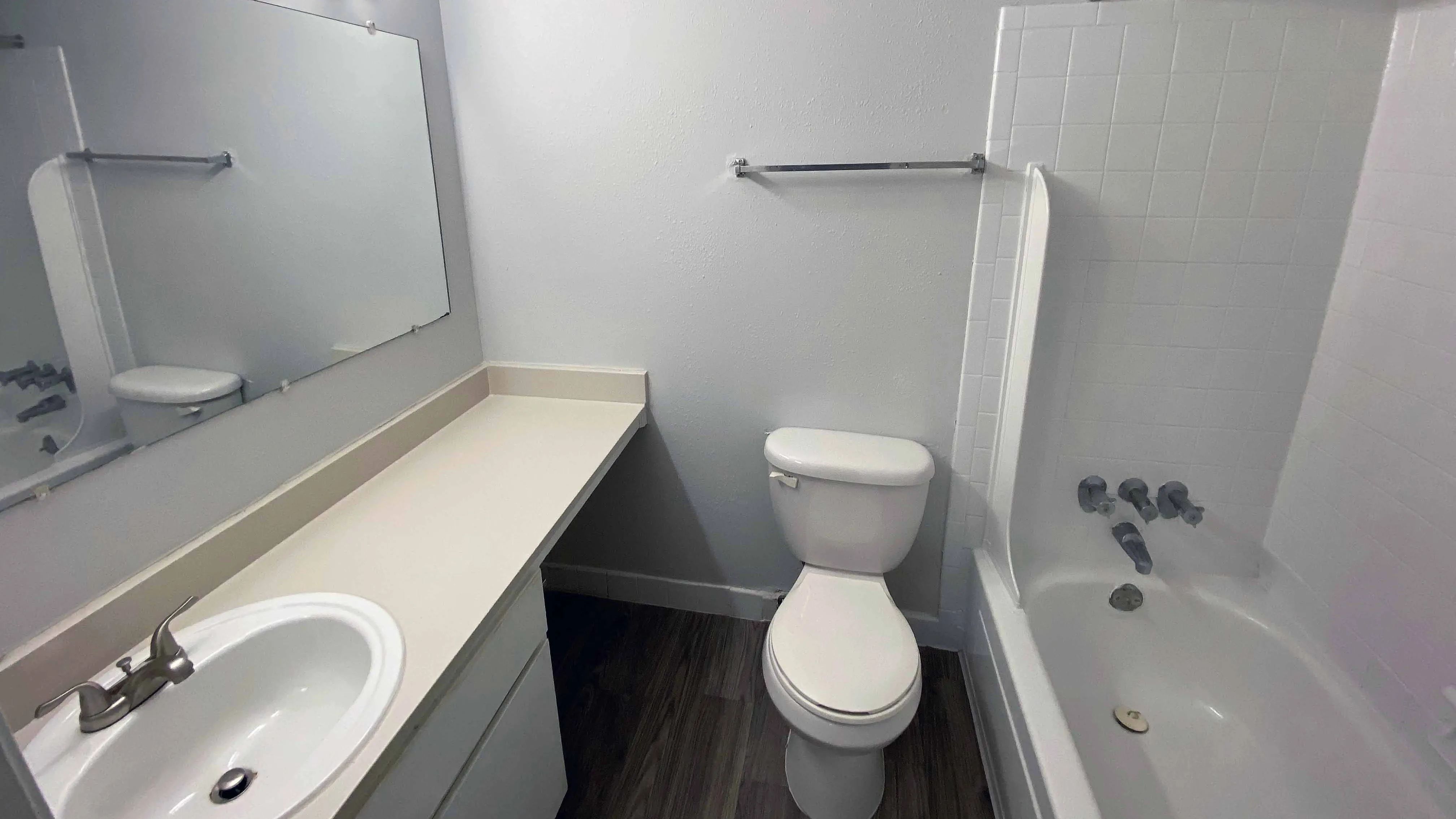 Step into your private haven in our spacious bathrooms, boasting generous countertops and large mirrors for your daily indulgence.