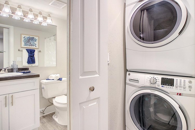 Stackable washer and dryer appliances are included for your convenience!