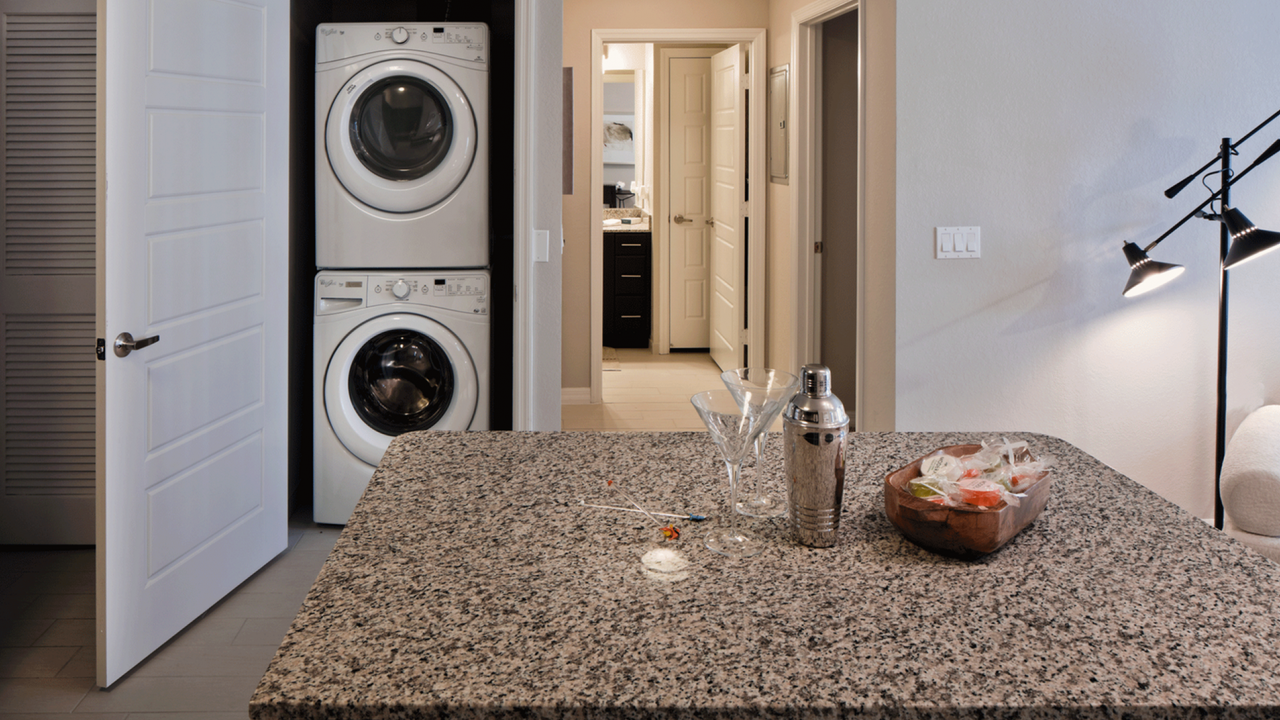 Stacked washer and dryer in each apartment.