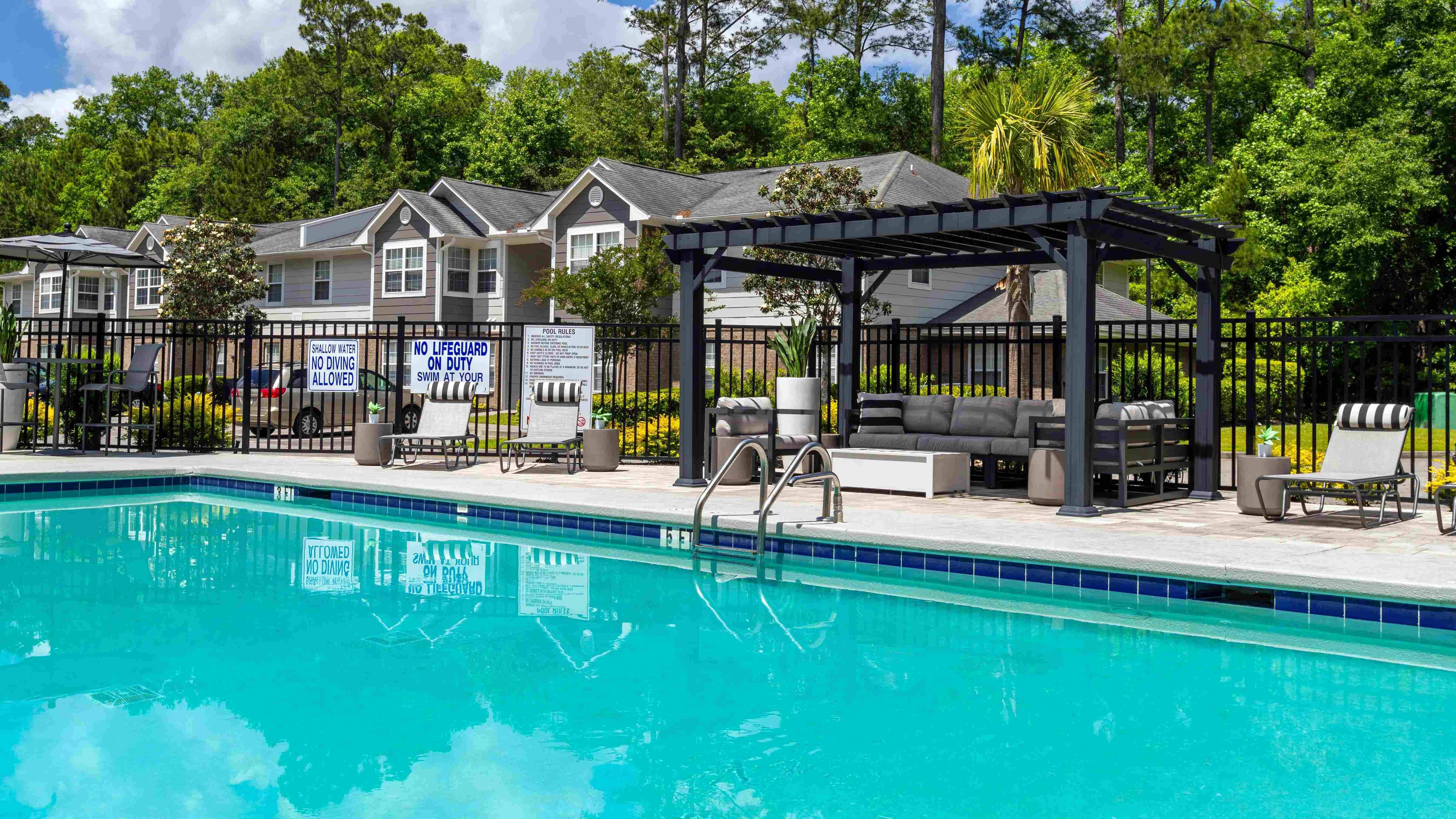 Cool off in our refreshing pool or under the shade of our poolside pergola.