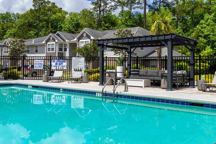 Cool off in our refreshing pool or under the shade of our poolside pergola.