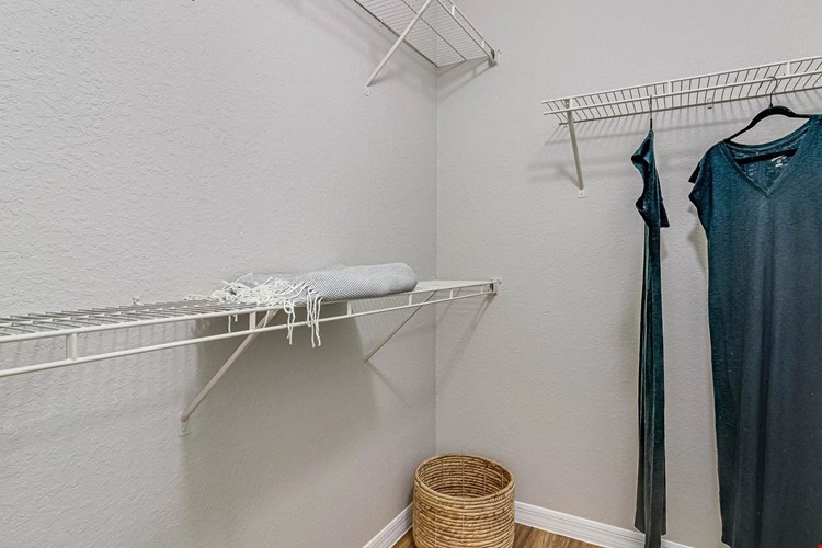 Enjoy the convenience of spacious walk-in closets with built-in organizers, designed to keep your wardrobe effortlessly neat and stylish.