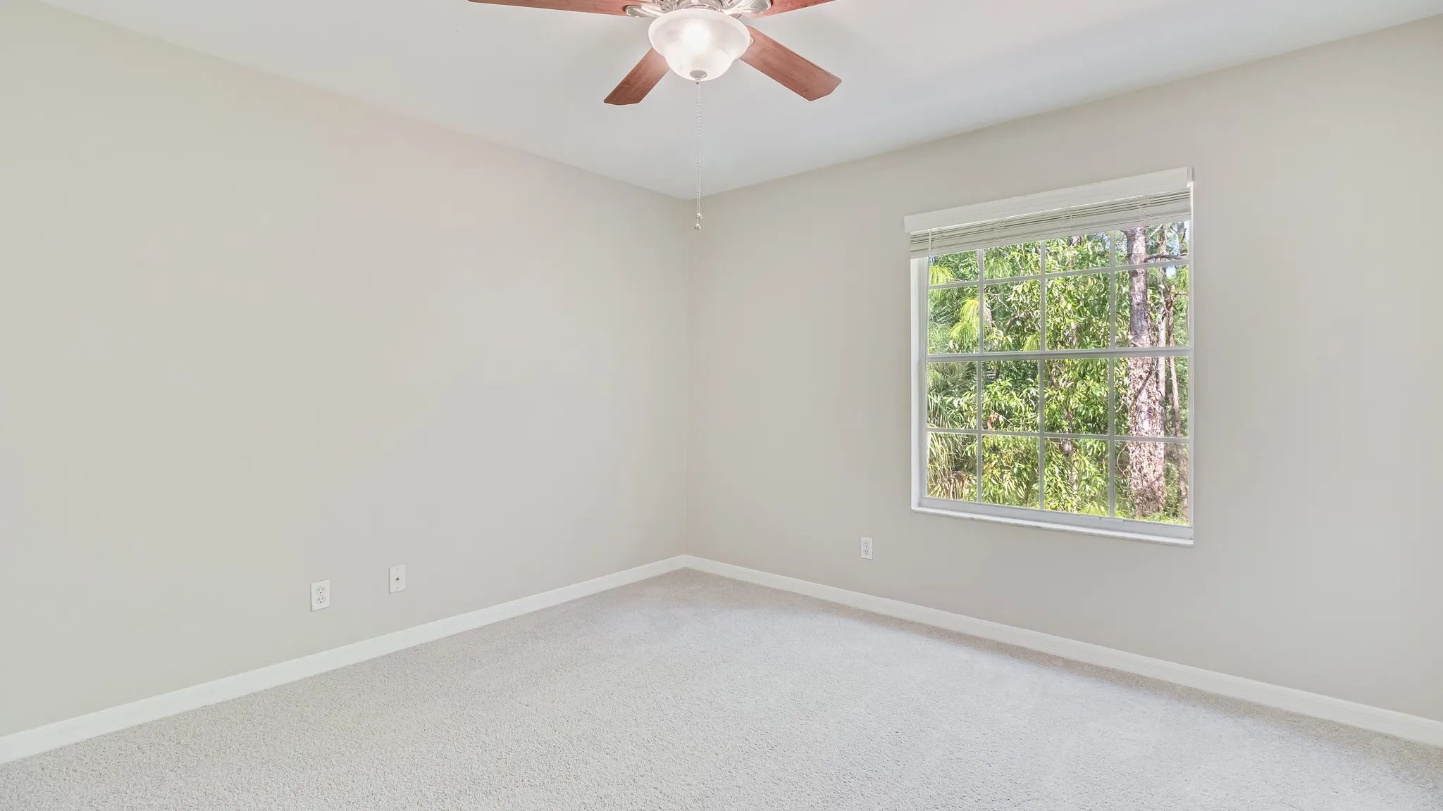 Our primary bedrooms include plush carpeting, ceiling fans, and plenty of space! 