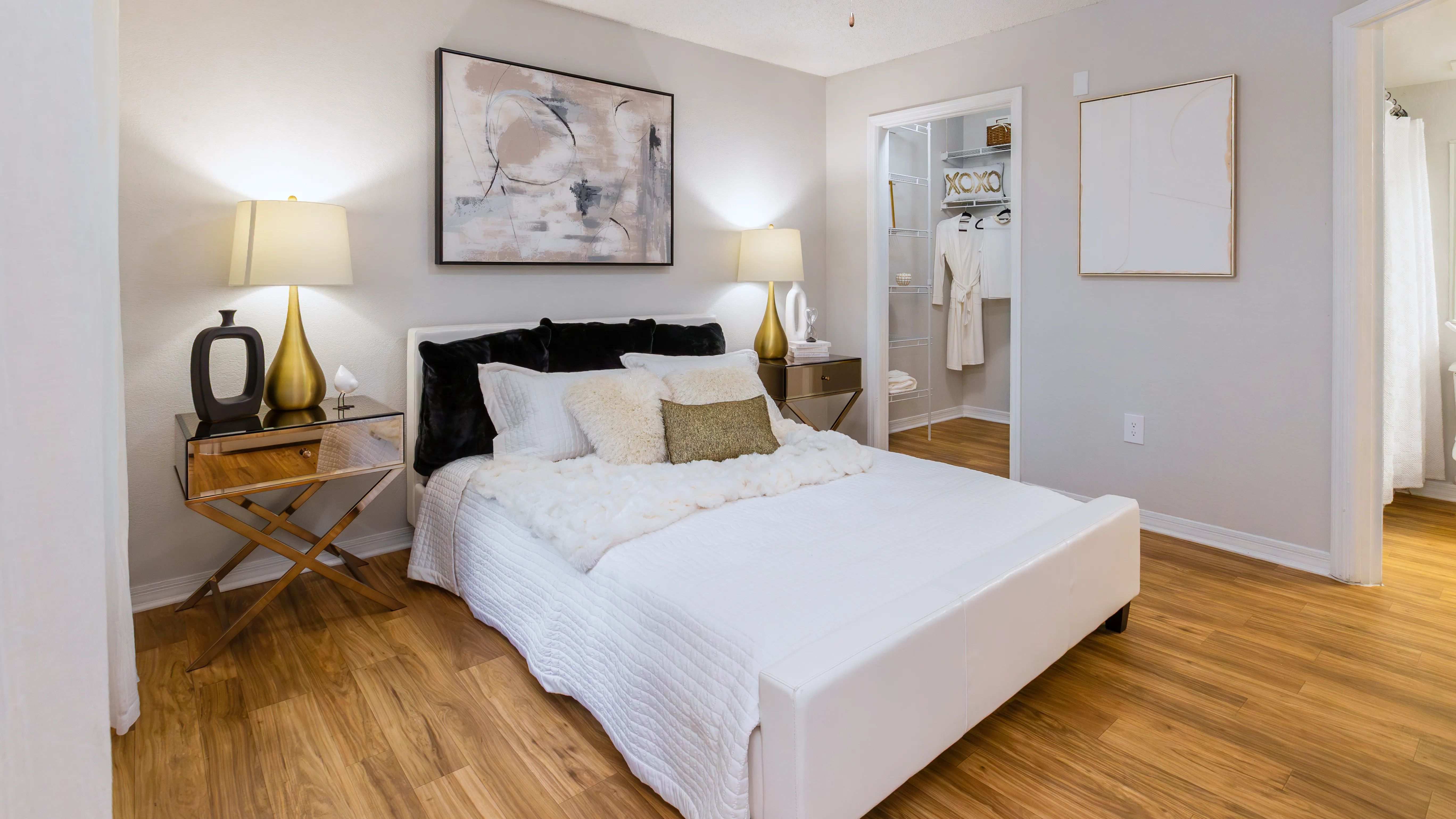 Rest and recharge in this serene master bedroom retreat, complete with wood-style flooring, a spacious walk-in closet, and a master bath.