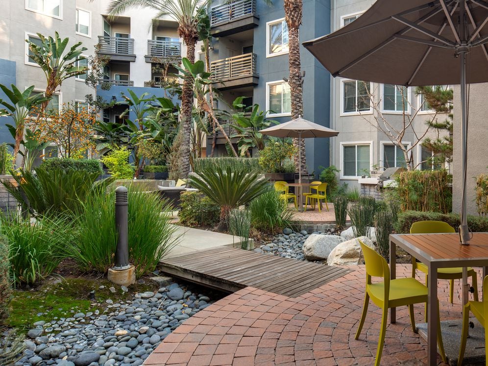 Courtyard with seating and dining areas