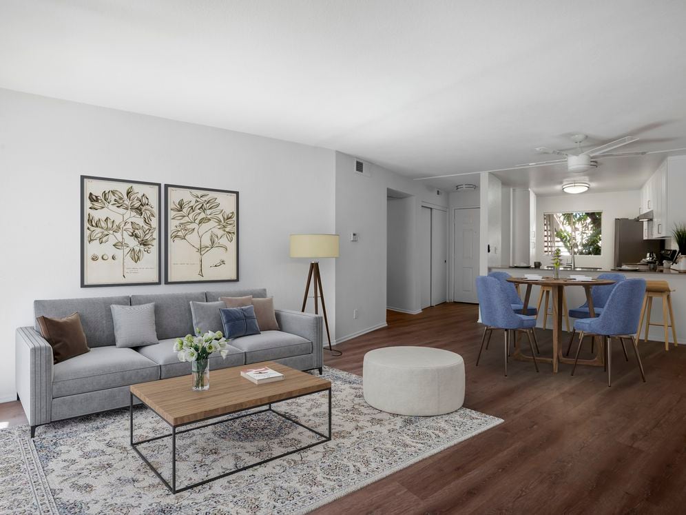 Renovated Package I living and dining room with hard surface flooring