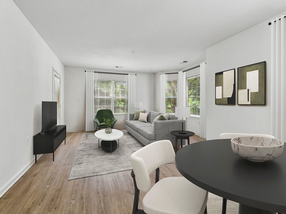 Renovated Package I living and dining area with hard surface flooring