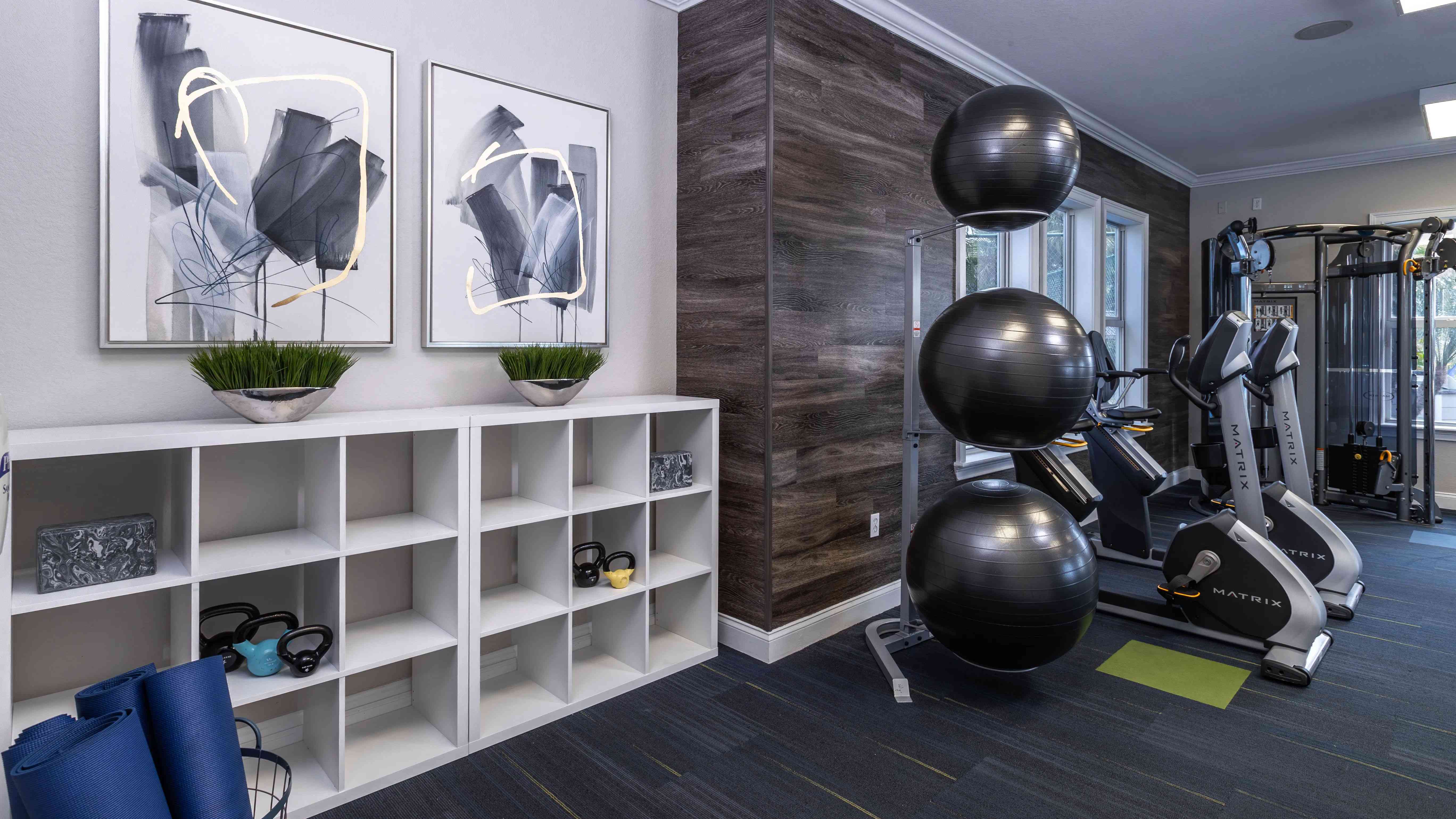 Achieve your wellness goals with top-tier gym equipment featuring kettlebells, yoga mats, and cardio machines.