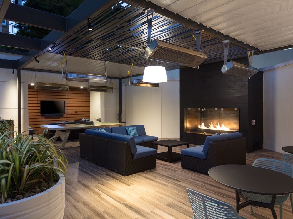 Outdoor Lounge with Game Table Fireplace and Lounge Seating