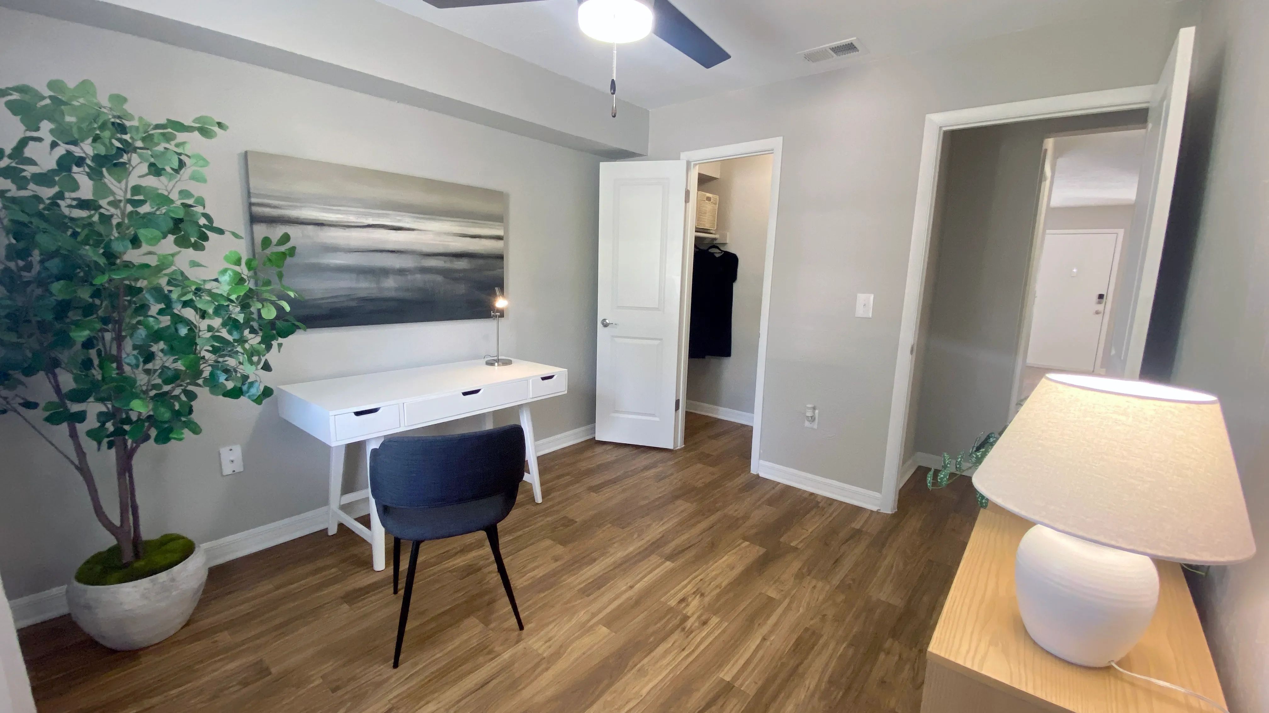 Elevate your work-from-home experience in a second bedroom turned office, complete with a large walk-in closet for efficient storage.