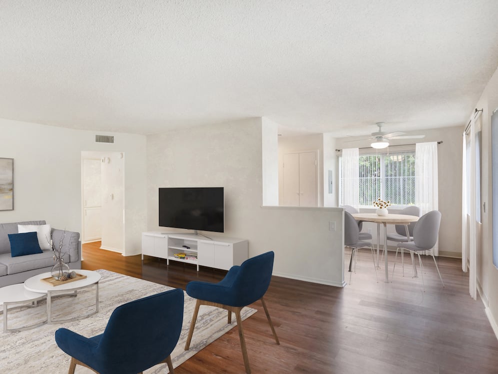 Renovated Package I living and dining area with hard surface flooring