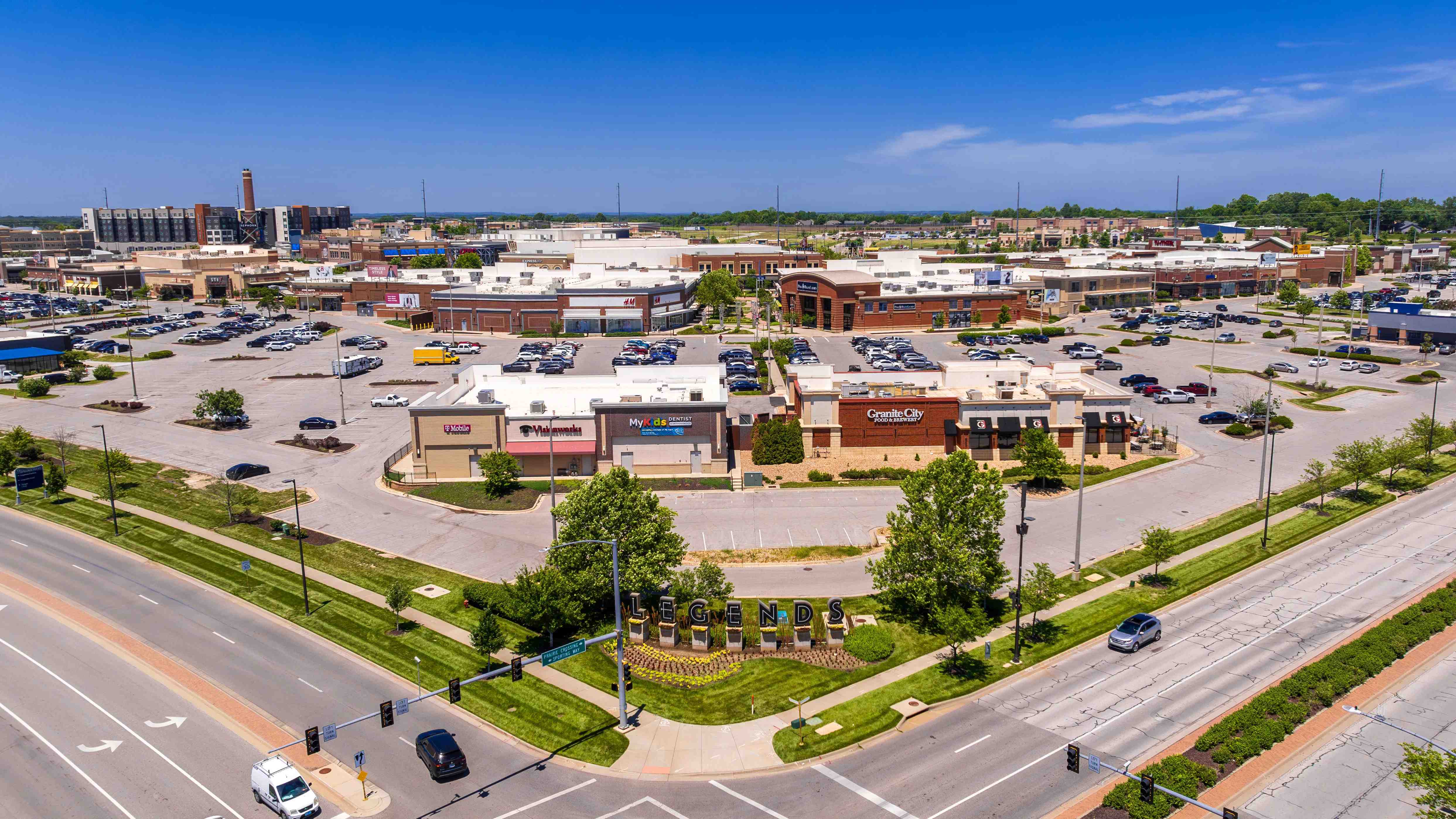 Discover the vibrant Legends Shopping Center, offering a diverse range of stores, dining options, and ample parking for a convenient shopping experience.