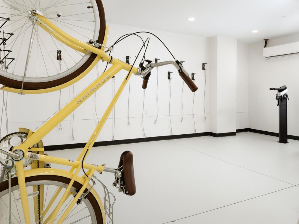 Bike storage room with bike repair station