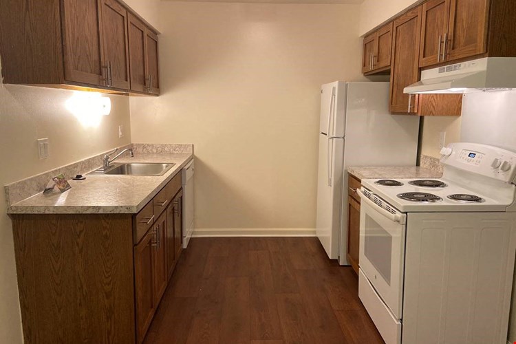 White Appliances at Lakeside Village Apartments Clinton Township 48038
