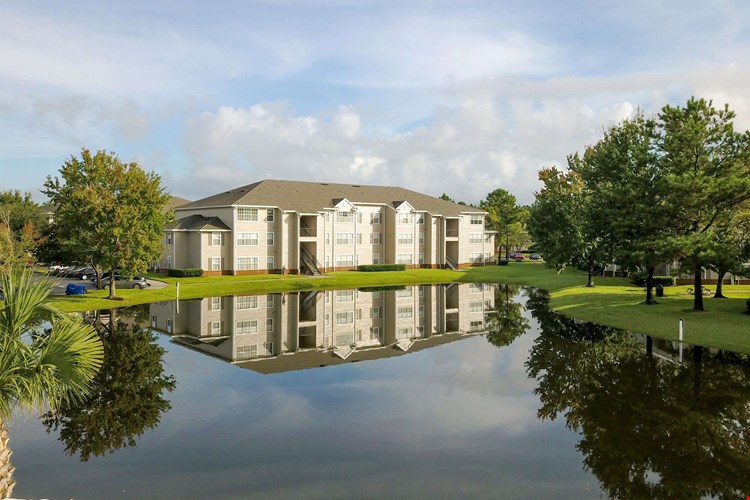 Unwind in a picturesque setting where nature and luxury meet in perfect harmony found in serene lake views from around the idyllic community.