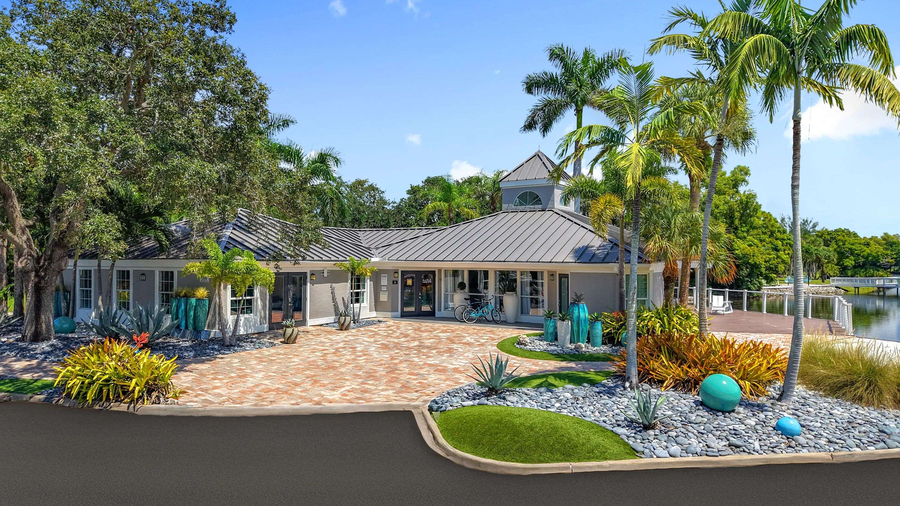Experience the laid-back Naples lifestyle from the moment you arrive at our stylish clubhouse, featuring a lakeside deck and vibrant tropical landscaping.