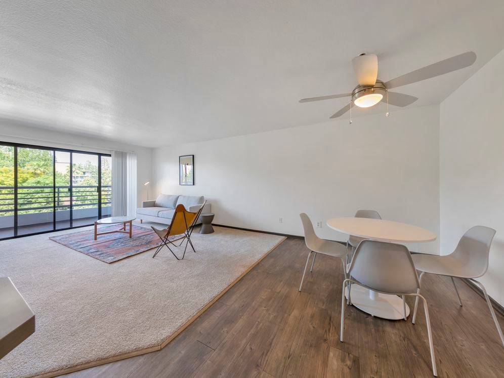 Furnished+ apartment homes include a dining set (Representative Image – exact items and style of furnishings may vary)