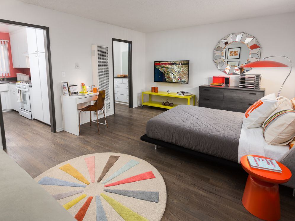 Classic Package II kitchen and living area with hard surface flooring (select homes)