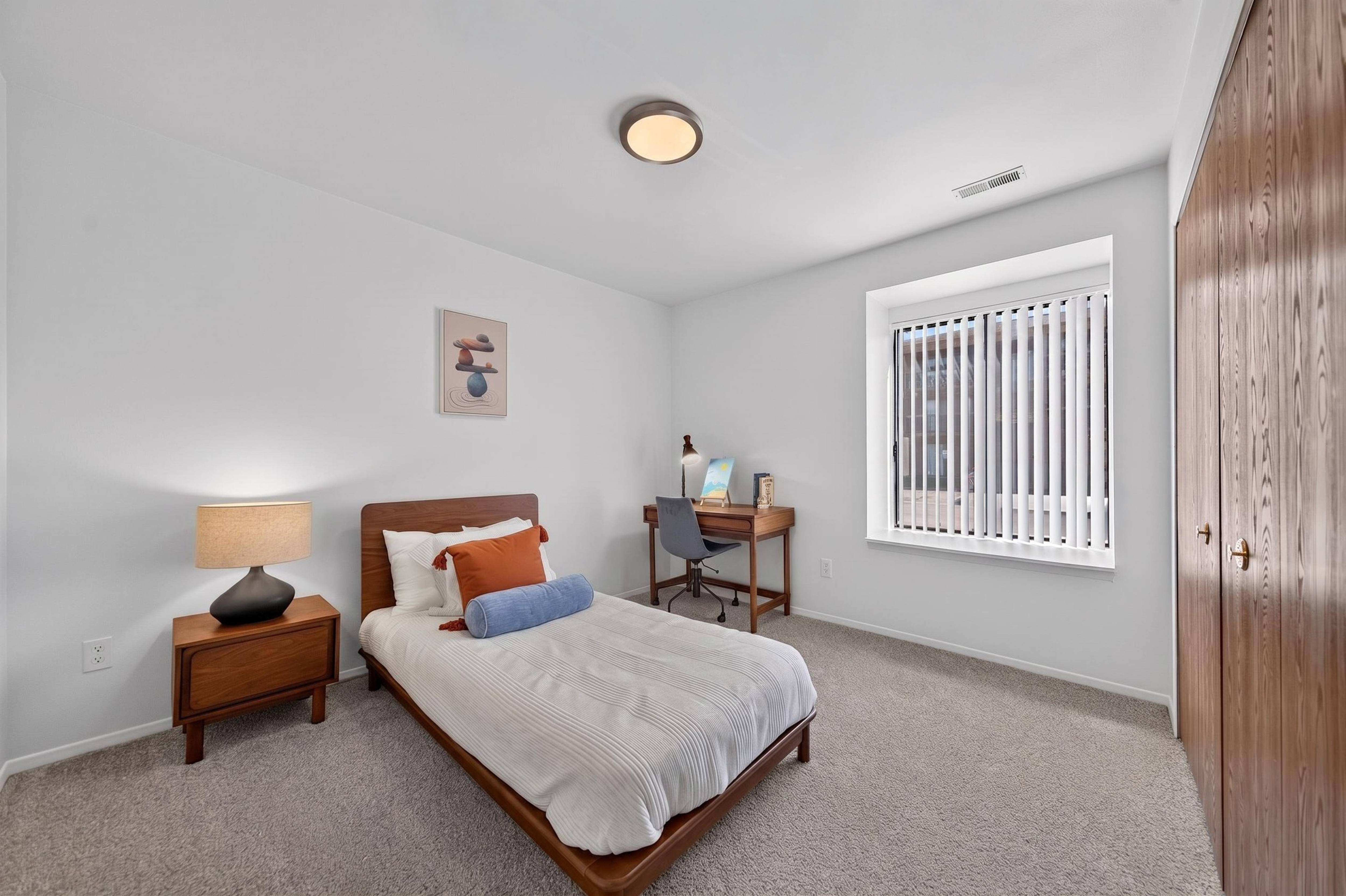 Spacious Bedroom with Ample storage at Lakeside Village Apartments in Clinton Township, MI