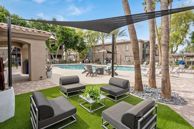 Relax poolside in one of our many luxurious seating areas.