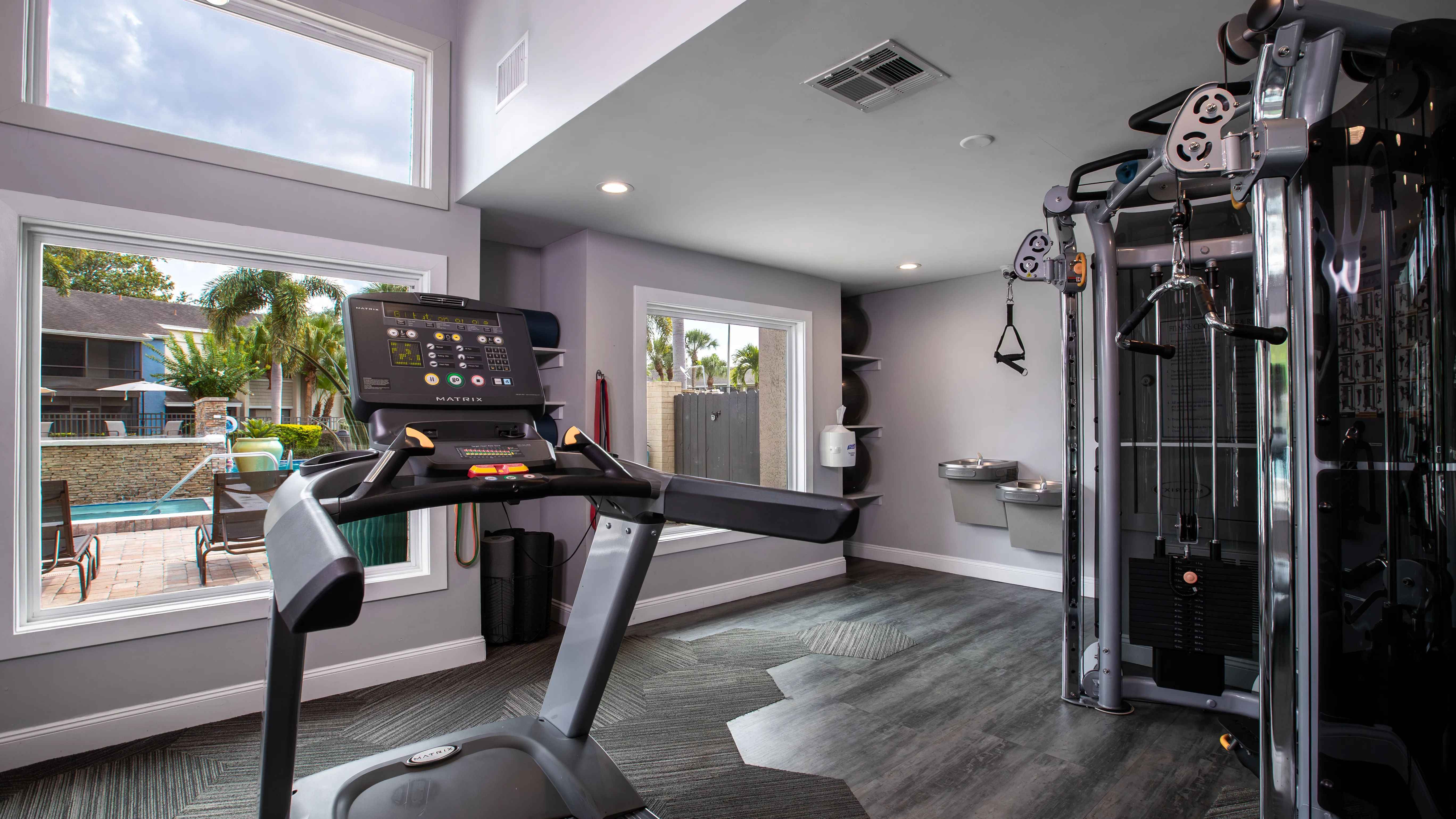 Stay motivated in our fully equipped fitness center with cardio and strength training gear—all with a refreshing view of the resort-style pool.