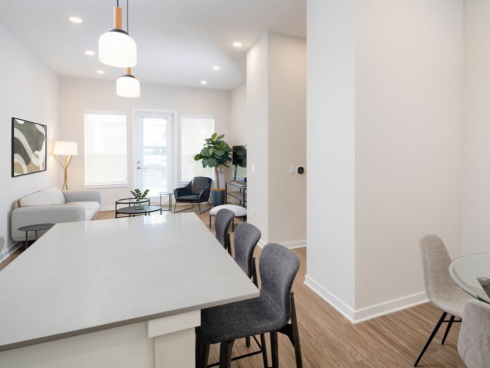 Upgrade Collection Living and dining areas with hard-surface vinyl plank flooring