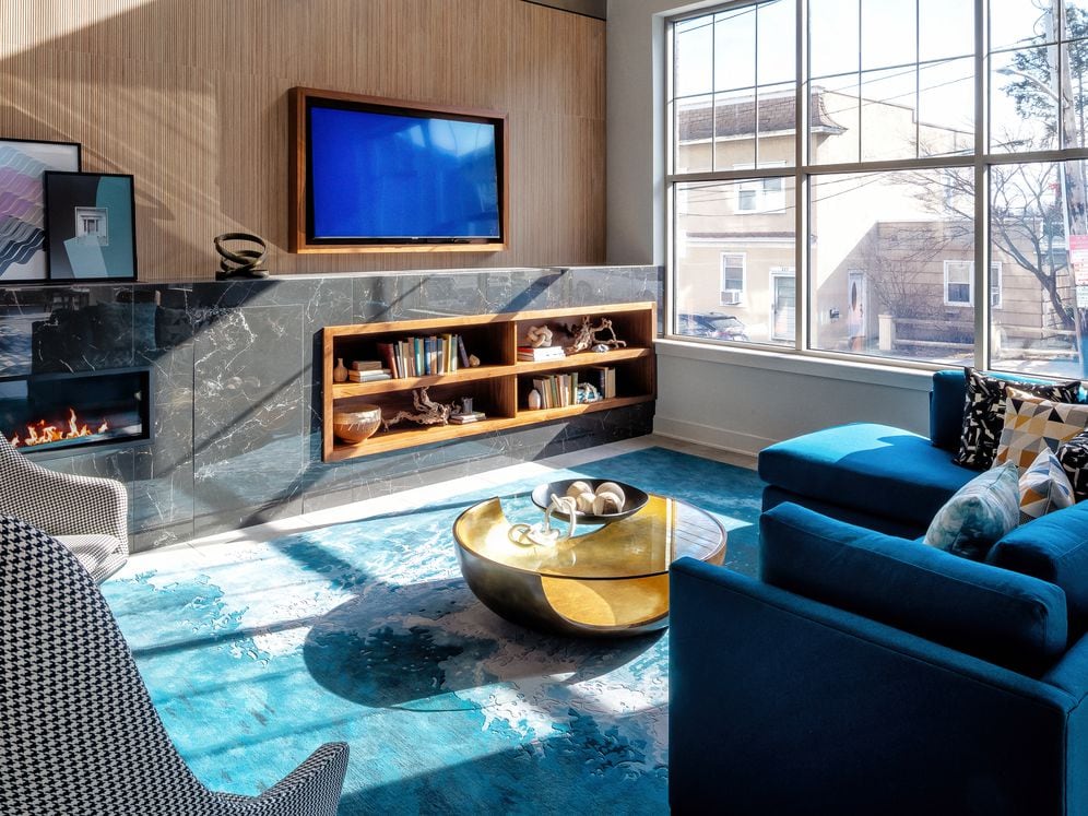 Resident lounge with seating and television