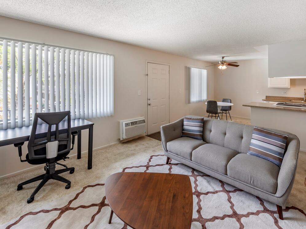 Furnished+ apartment homes include a dining set (Representative Image – exact items and style of furnishings may vary)