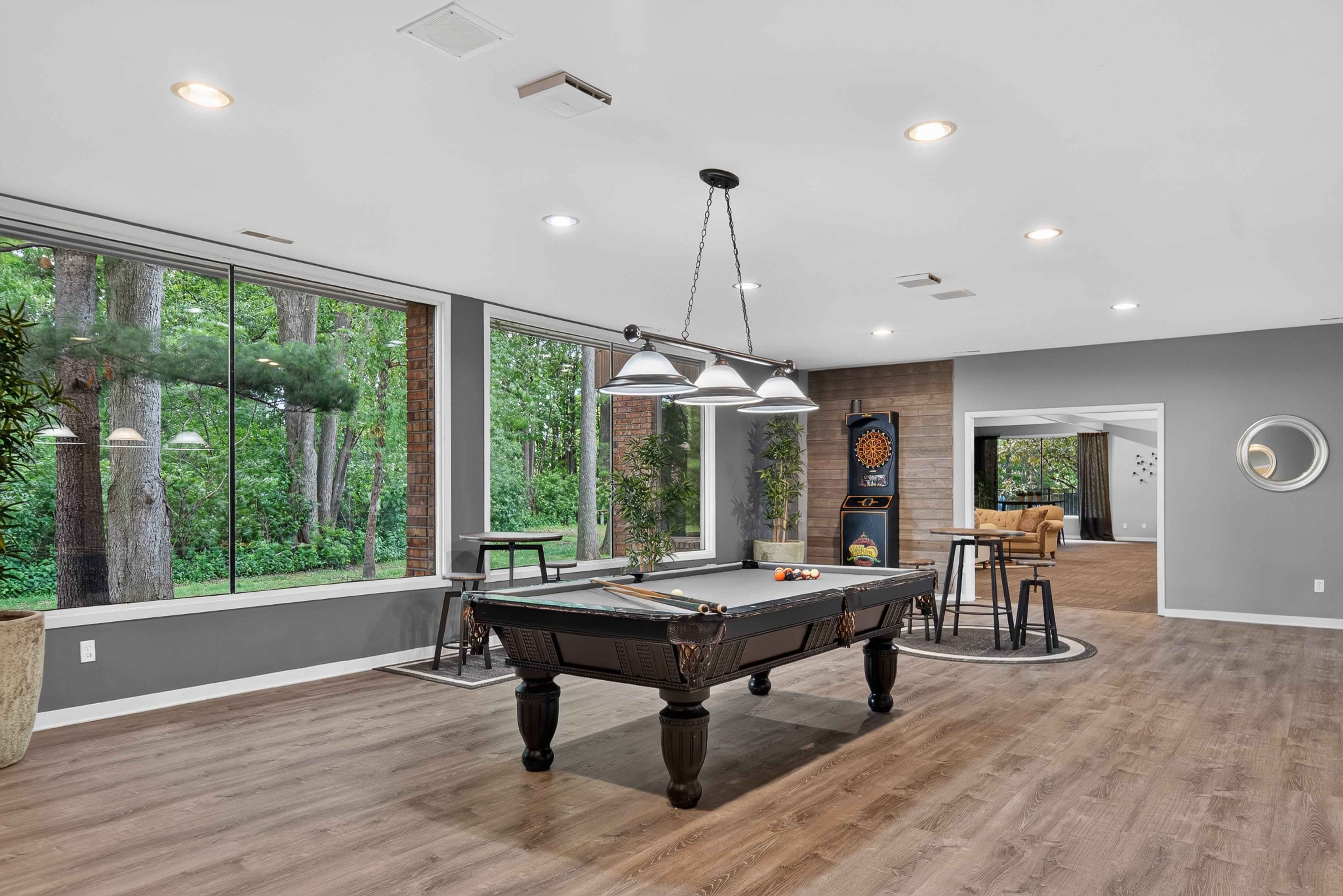 Game room with billiards at Eastwood Village Apartments in Clinton Township, MI.