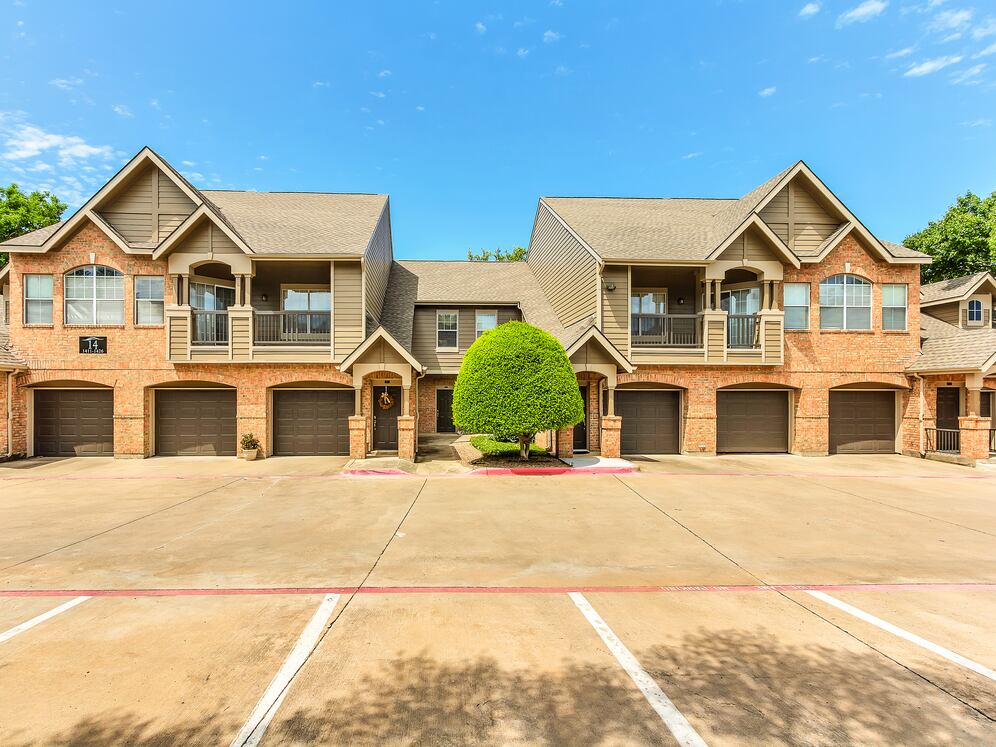 Attached garages with every apartment, building exterior