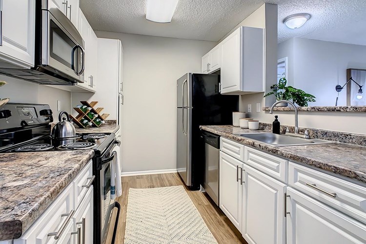 Plenty of counter space, and stainless steel appliances in every home.