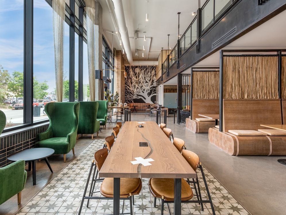 Lobby area with lounge seating and co-working spaces