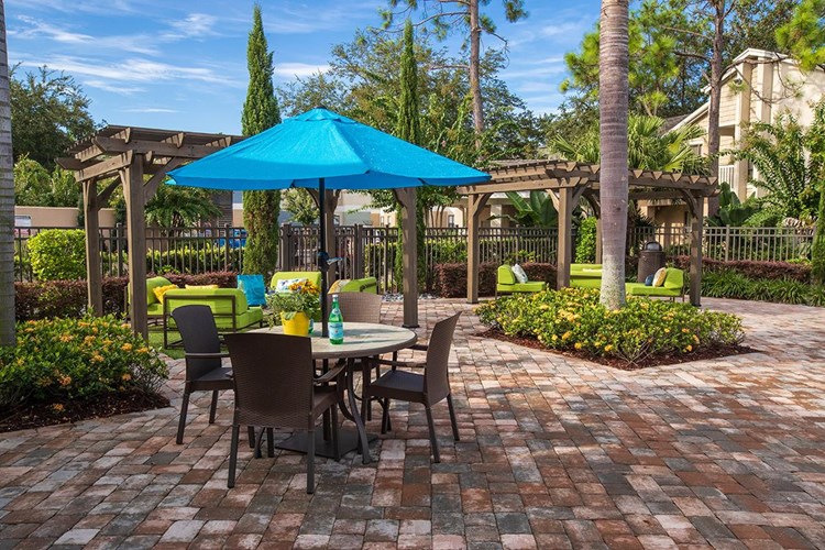 Our sundeck offers plenty of tables with umbrellas.