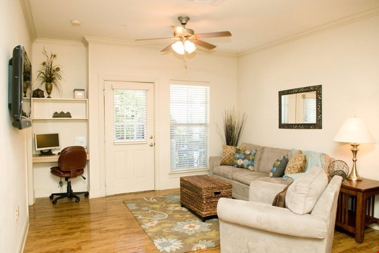 Living Room with Wood floors and built in computer nook