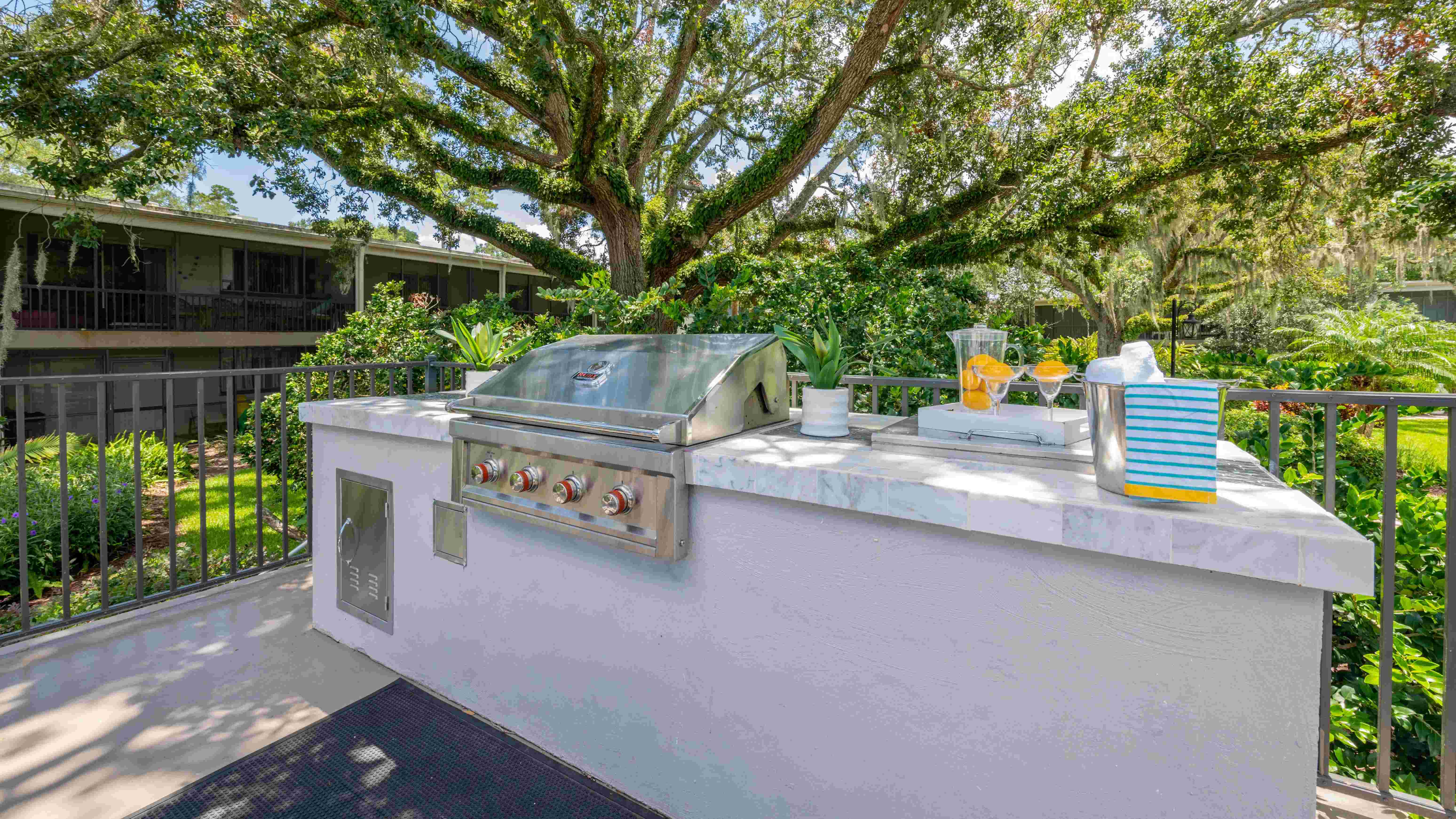 Unleash your inner grill master at our outdoor kitchen, designed for delightful gatherings. Be the host with the most!