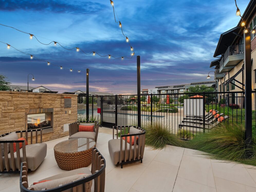 Outdoor lounge with fireplace