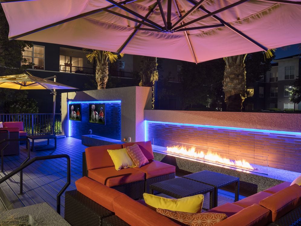 Outdoor Lounge Seating With Fire Table And TVs