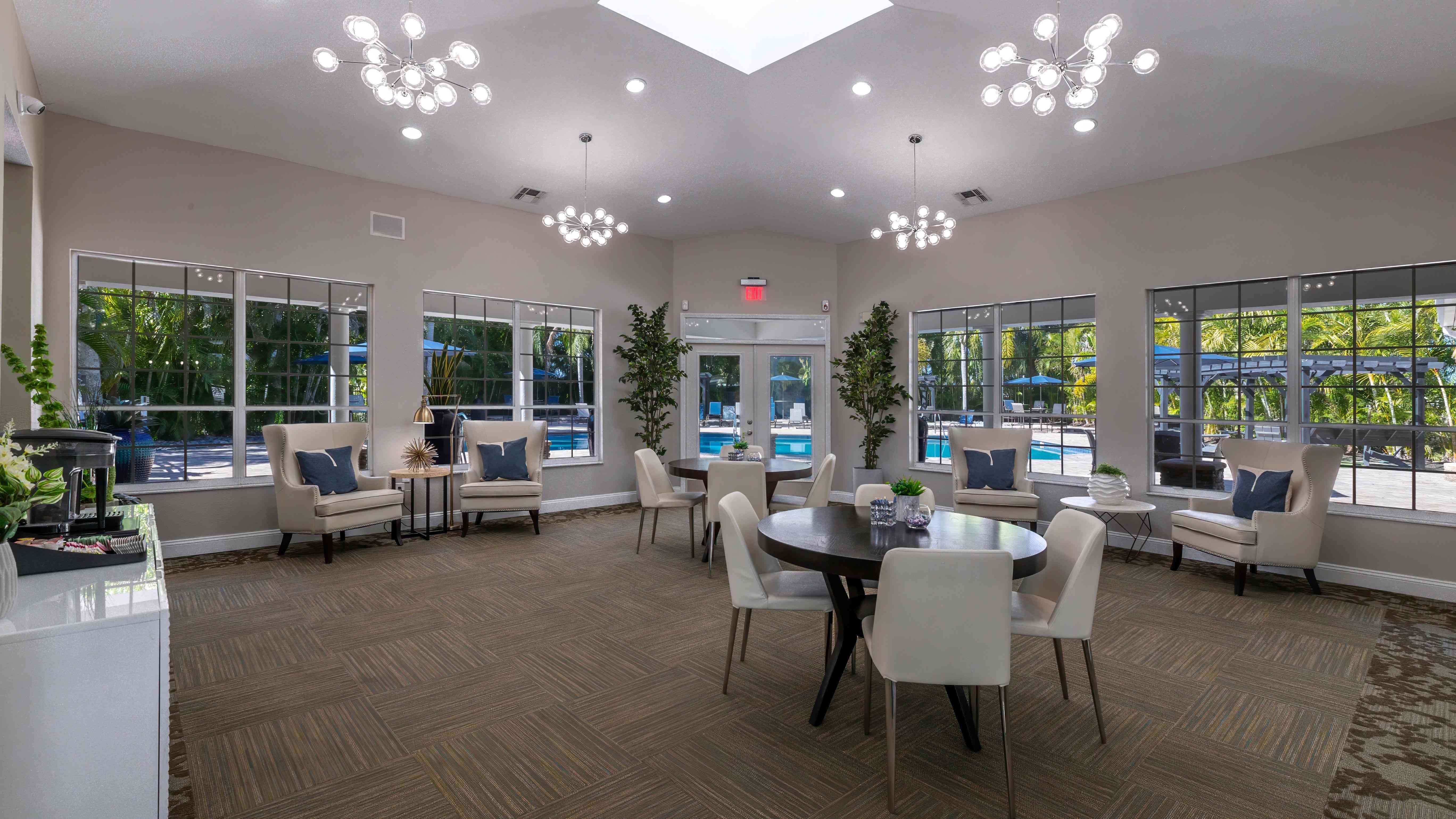 Our clubhouse at Meadow Lakes is designed for comfort and convenience, offering cozy lounge seating, stylish décor, and access to the pool area.