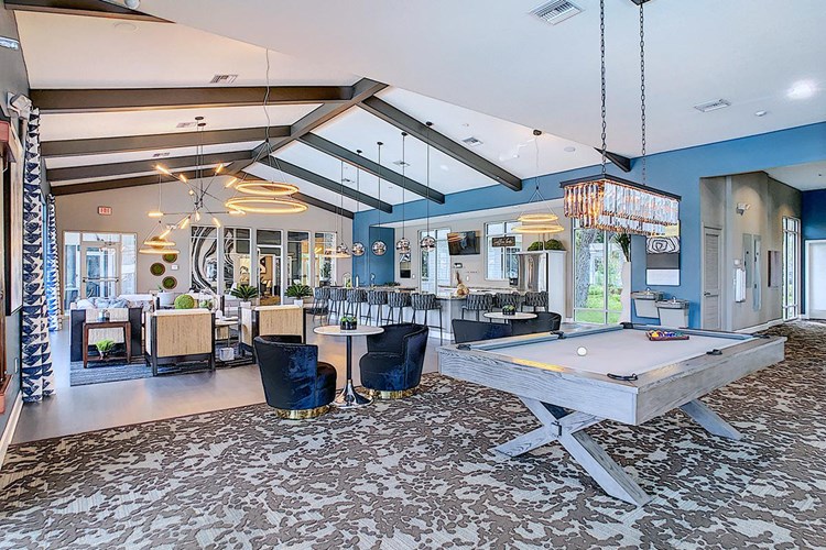 Expansive clubhouse featuring a billiards room, full kitchen and fitness center.