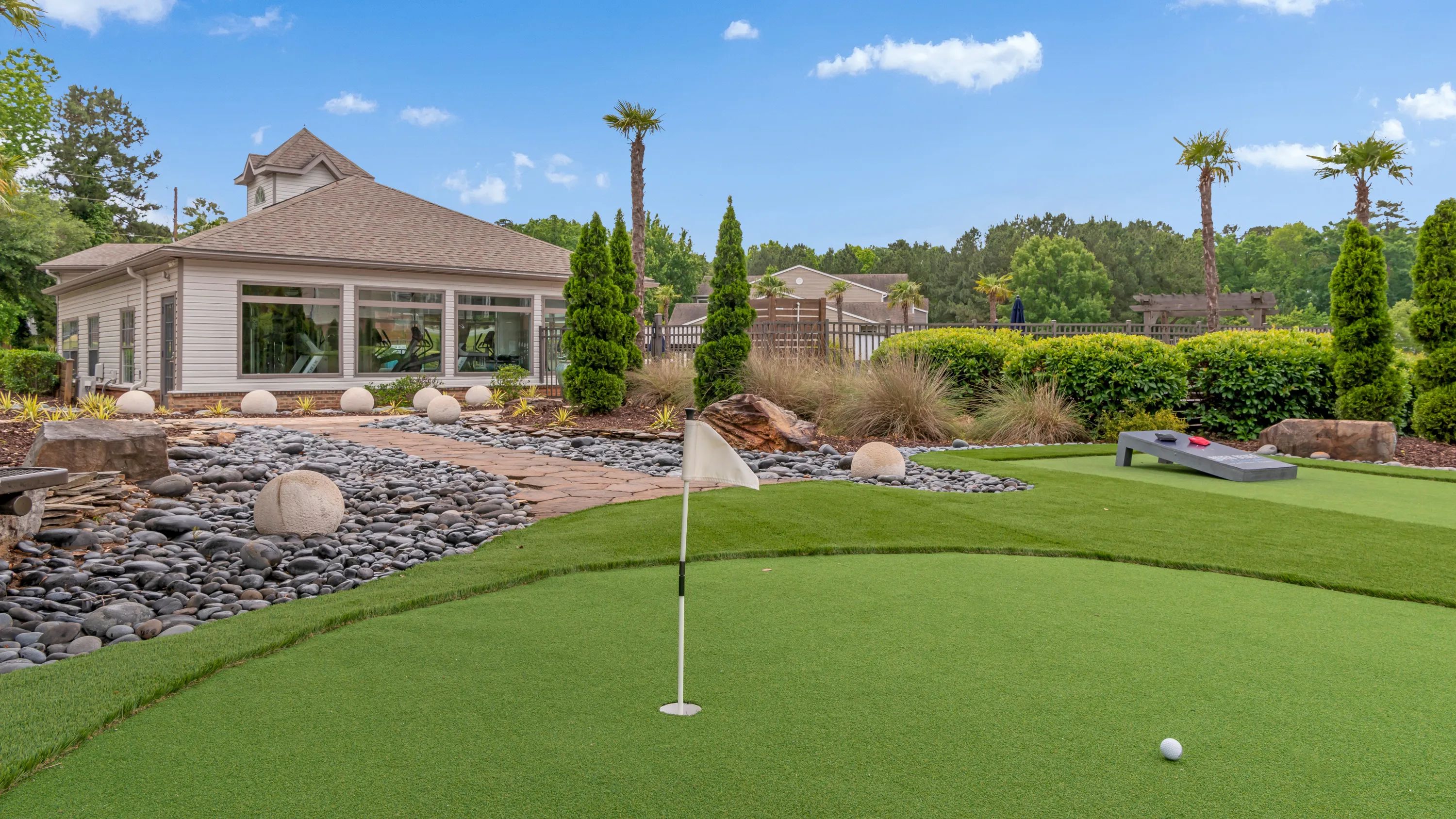 Enjoy solo games or lively matches with neighbors on our picturesque putting green.