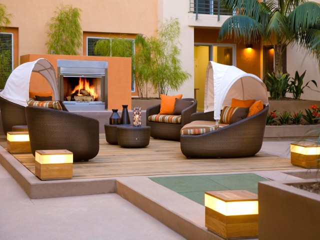 Enjoy an evening relaxing by outdoor fireplace