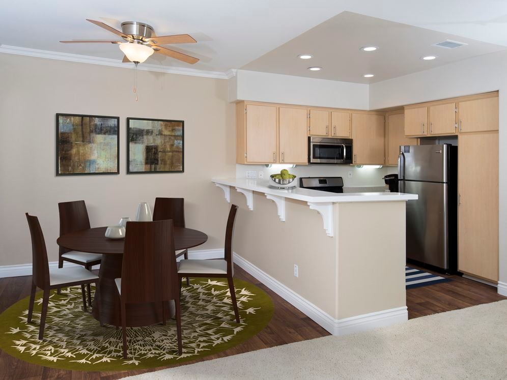 Kitchen and dining room with hard surface flooring