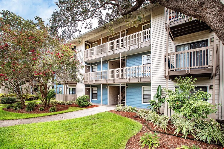 You'll be welcomed home to freshly painted buildings and lush landscaping.