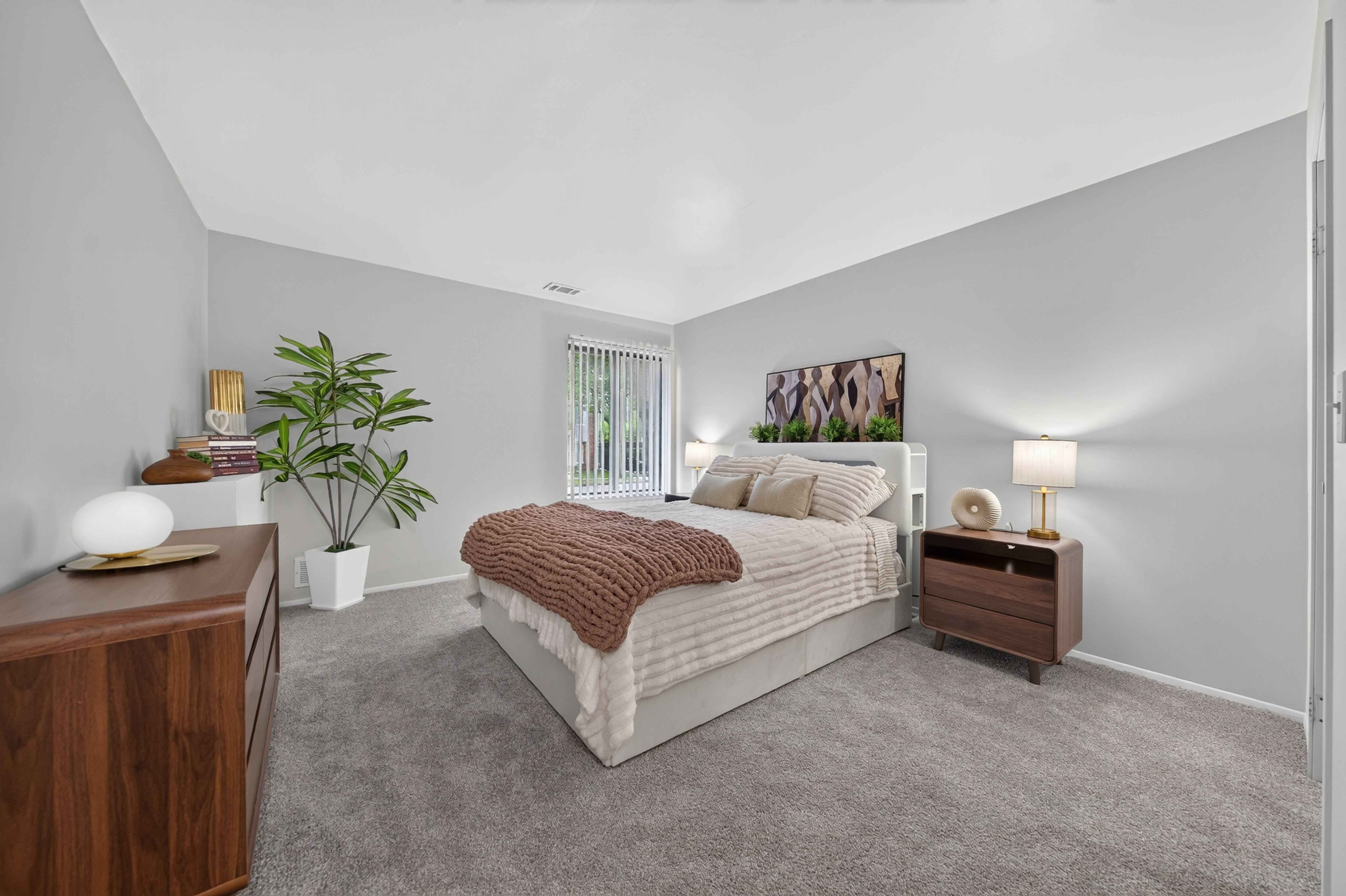 Cozy bedroom with ample storage at Park Lane Apartments in Southfield, MI.