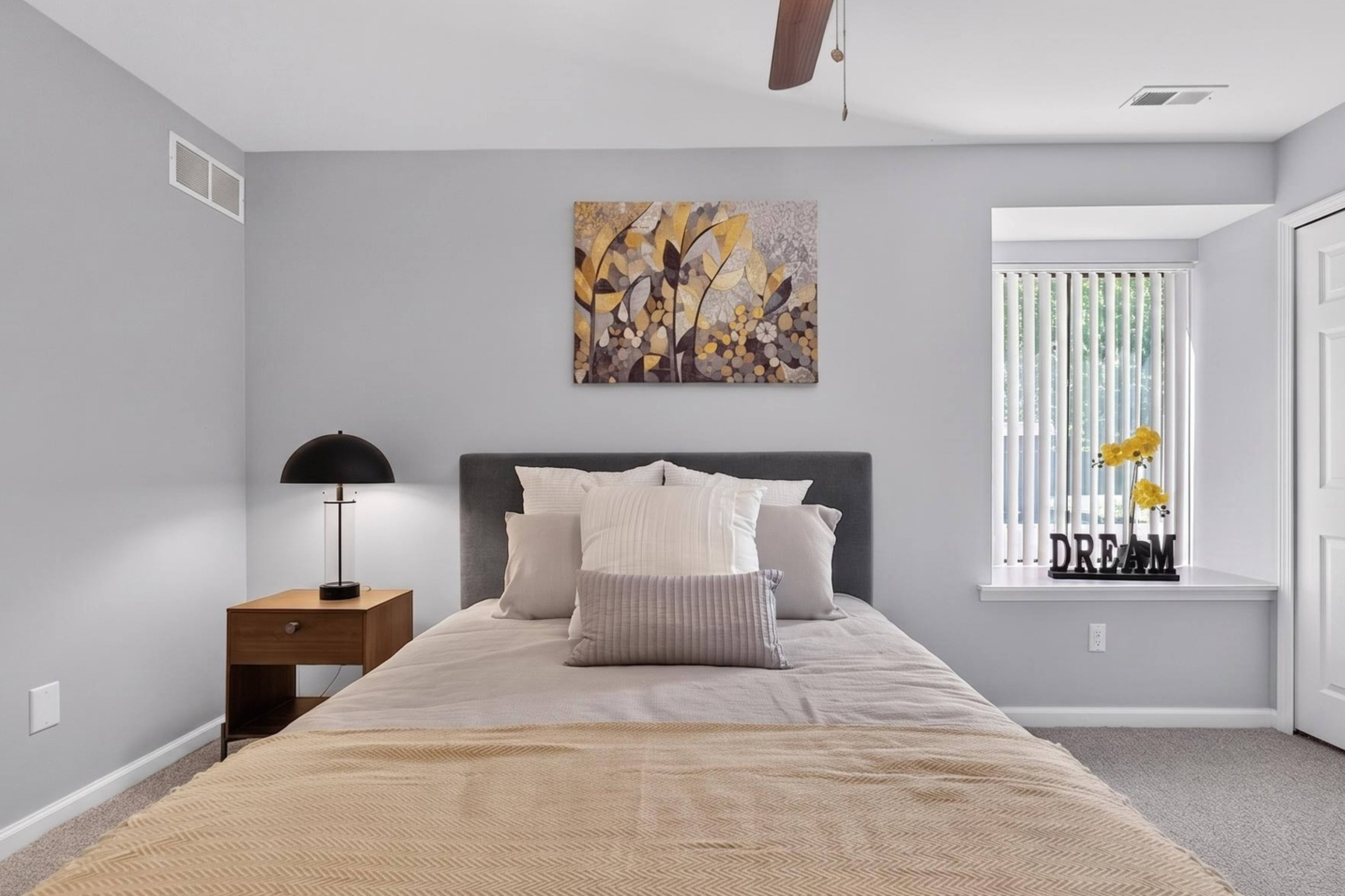 Spacious Bedroom with Ample Storage at Lakeside Village Apartments in Clinton Township, MI