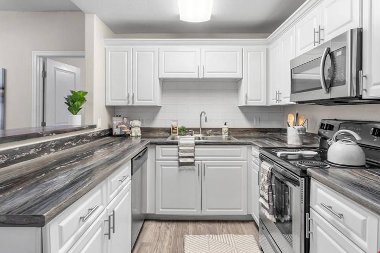 Unleash easy, stylish living with gleaming stainless-steel appliances.