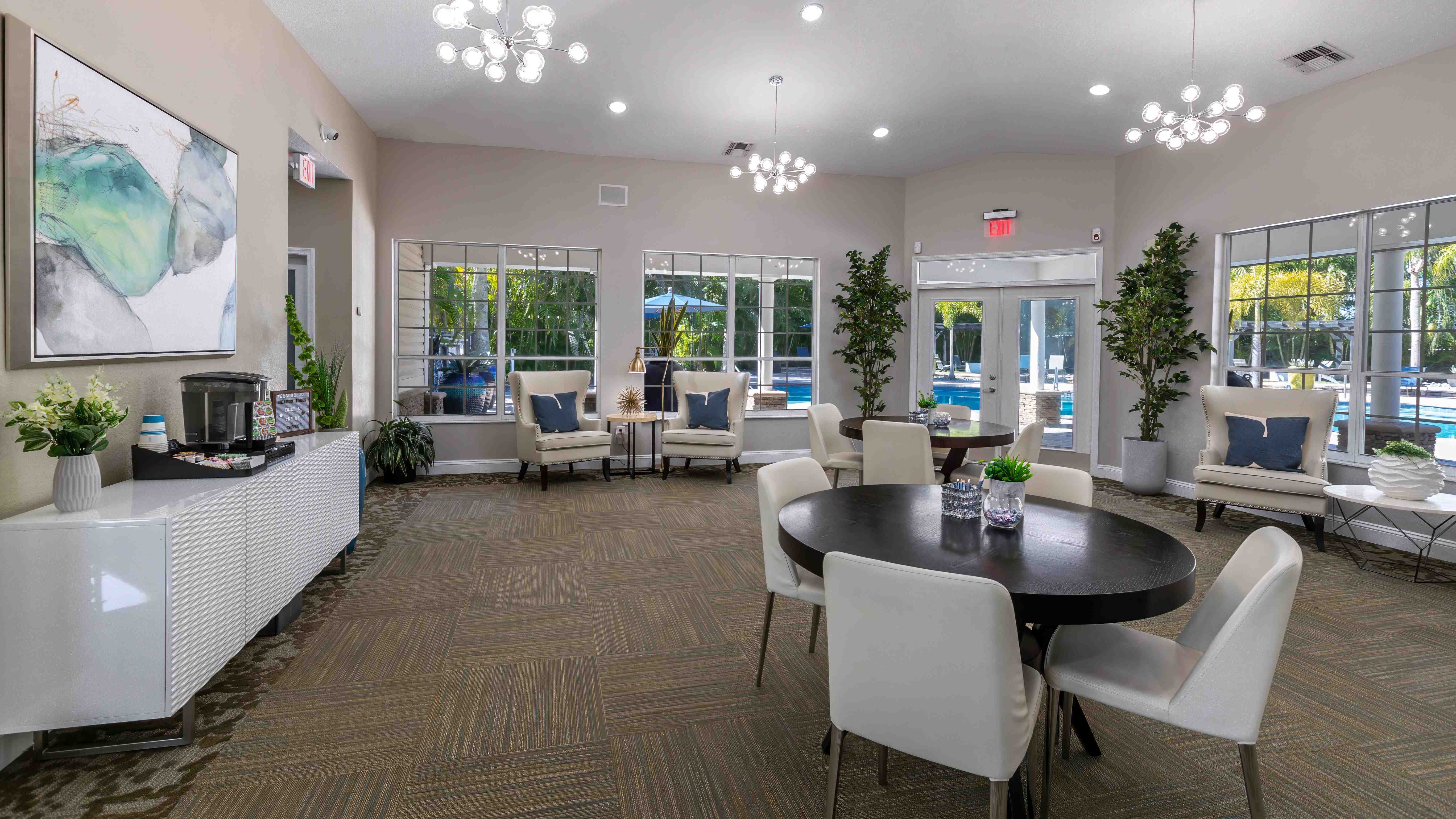 Step into comfort and convenience at the Meadow Lakes clubhouse, featuring stylish seating, modern décor, and a welcoming atmosphere. Whether you're here to relax, socialize, or meet with our team, this space has it all.