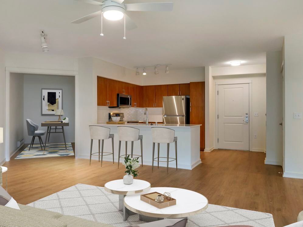 Renovated Package I kitchen and living room with hard surface flooring