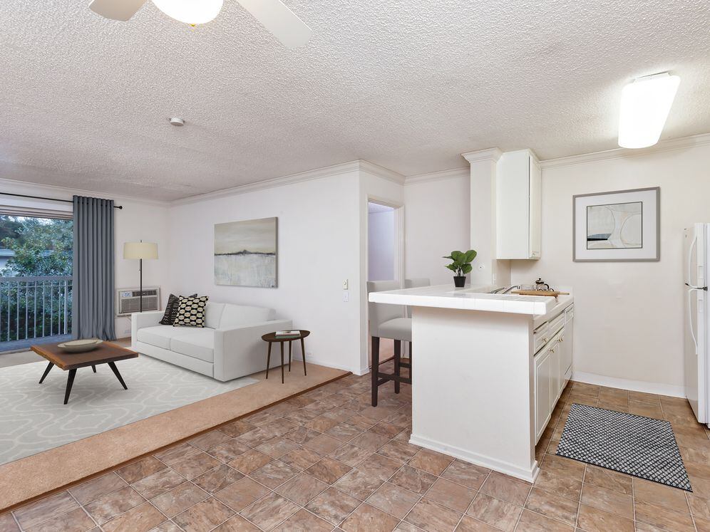 Classic Package I kitchen and living area with vinyl flooring (select homes)